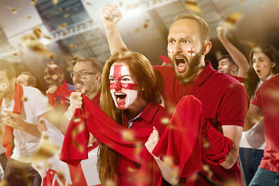 Man and Woman Cheering For England Football Team