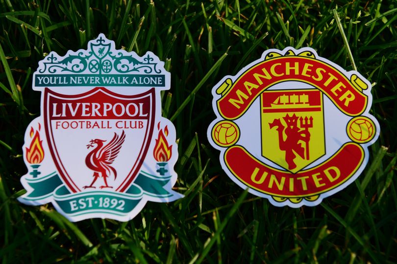 Liverpool and Manchester United Badges on Grass