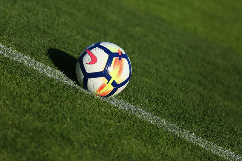 Premier League Football on Pitch at Angle